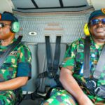 Air Chief Sunday Aneke visits the Igbokoda crash site during the Igbokoda crash probe