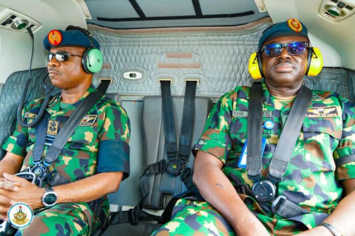 Air Chief Sunday Aneke visits the Igbokoda crash site during the Igbokoda crash probe